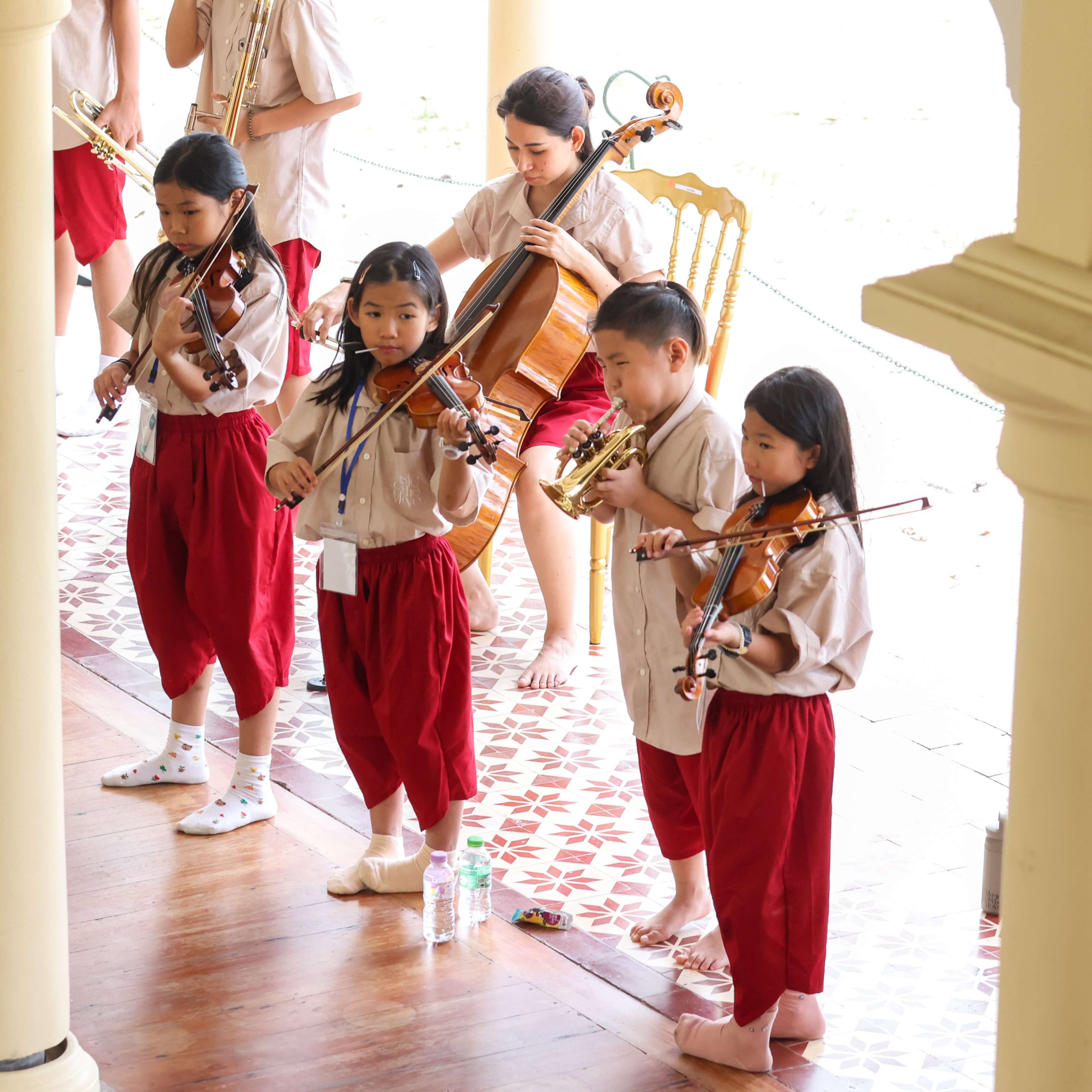 Young musicians gather for a unique music camp in Hua Hin, combining intensive chamber music training with performances at iconic venues - Image